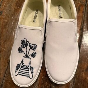 Bucket Feet White Graphic Slip-on Athletic Shoes